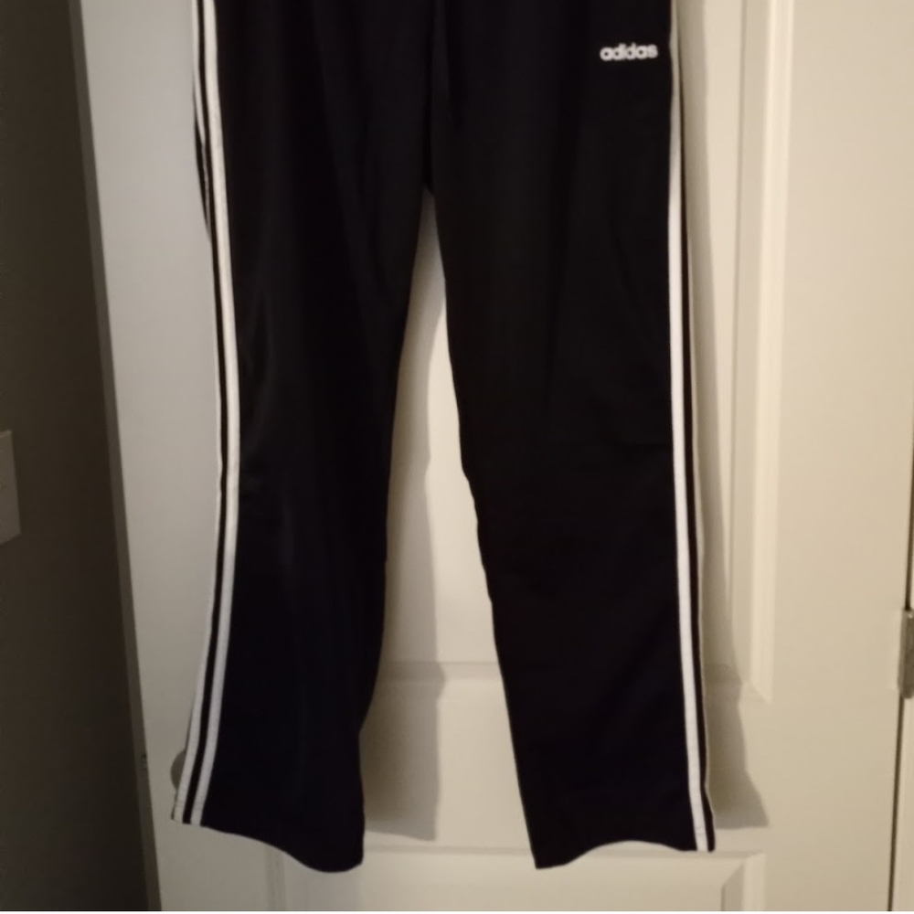 Adidas Black and White Sweatpants with Iconic Stripes